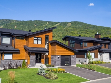 Le Legs des Pionniers - Maisons neuves Au Saguenay avec units modles En occupation En construction avec ascenseur prs d'une gare: Studio/loft